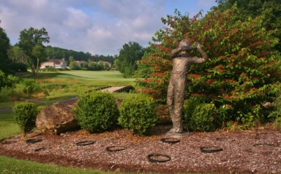 The gardens around the Great Bear clubhouse get you in the mood for golf. In the background is the conclusion of the par five 18th hole.